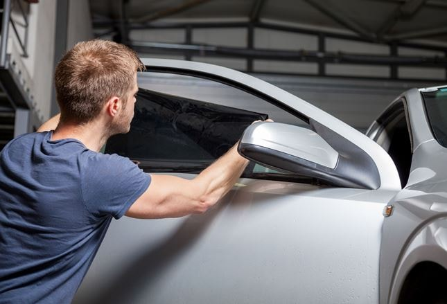 Applying window tint on cars